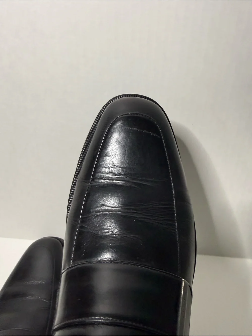 Gucci Black Leather Men's Slip-On Loafers with silver engraved bar